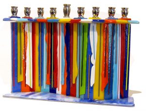 Candle Drip Menorah by Sue Goldsand, 7" x 10" x 2.5", glass, metal, $300