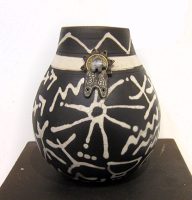 Petroglyph Vase w/ adornment
Jill Smith
8" x 6"
clay
$160