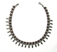 Camoflage Daggers
Adriana Walker
Necklace
handwoven with seed beads
$168