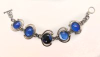Night Skys
Adriana Walker
silver and fused glass
$148